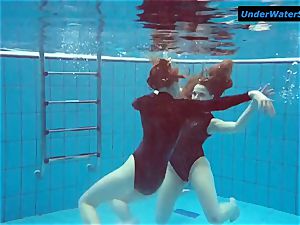 2 sizzling teenagers underwater