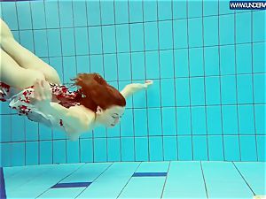red-hot polish ginger-haired swimming in the pool