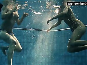 two splendid amateurs showing their bods off under water